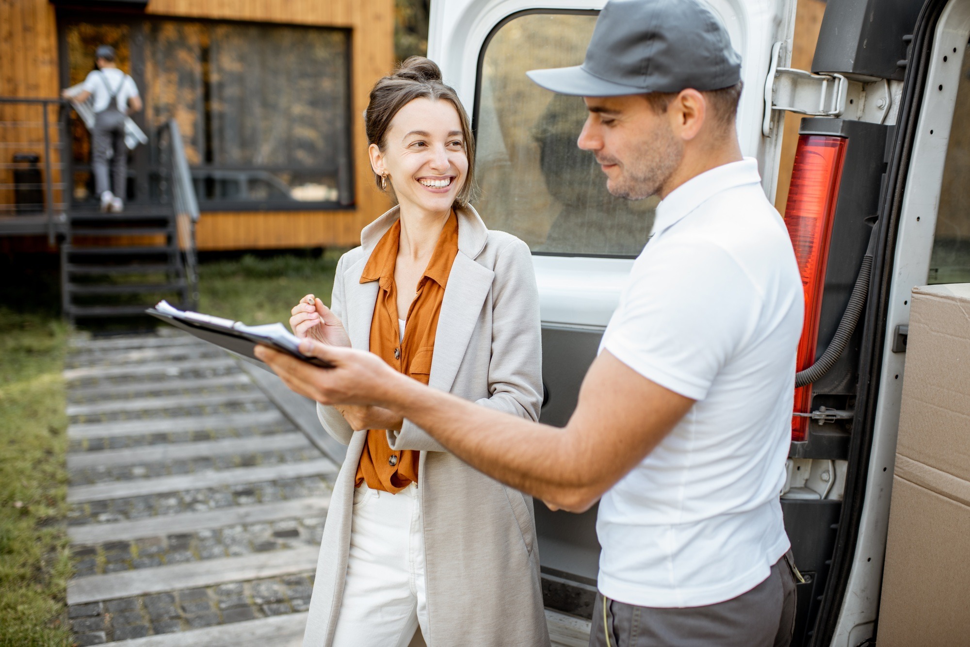 Movers delivering goods during a relocation